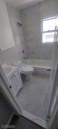 a bathroom with a sink and toilet