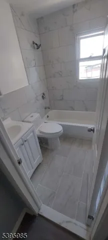 a bathroom with a sink and toilet