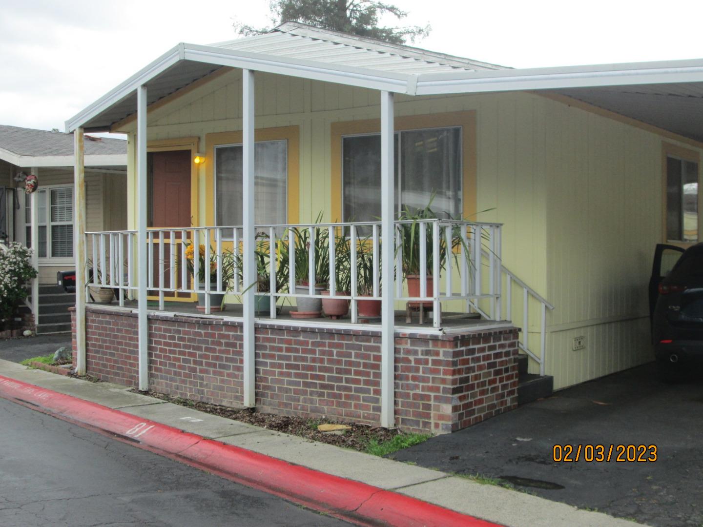 front of a house with a small yard