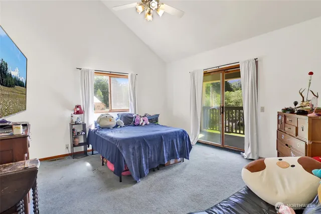 a bed room with furniture and a window