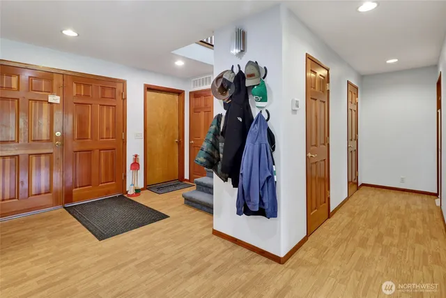 a view of a hallway with a flower pot