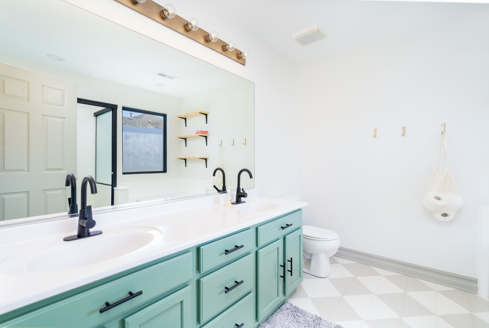 17523 Gilbert Drive Lockport, IL 60441 - Photo 19 of 34 a bathroom with a double vanity sink toilet and mirror