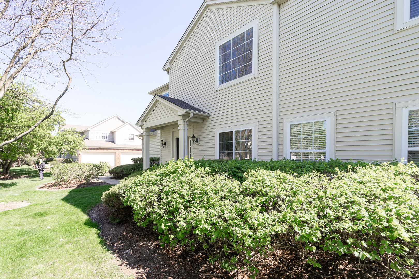 17523 Gilbert Drive Lockport, IL 60441 - Photo 2 of 34 a view of a house with a yard and potted plants