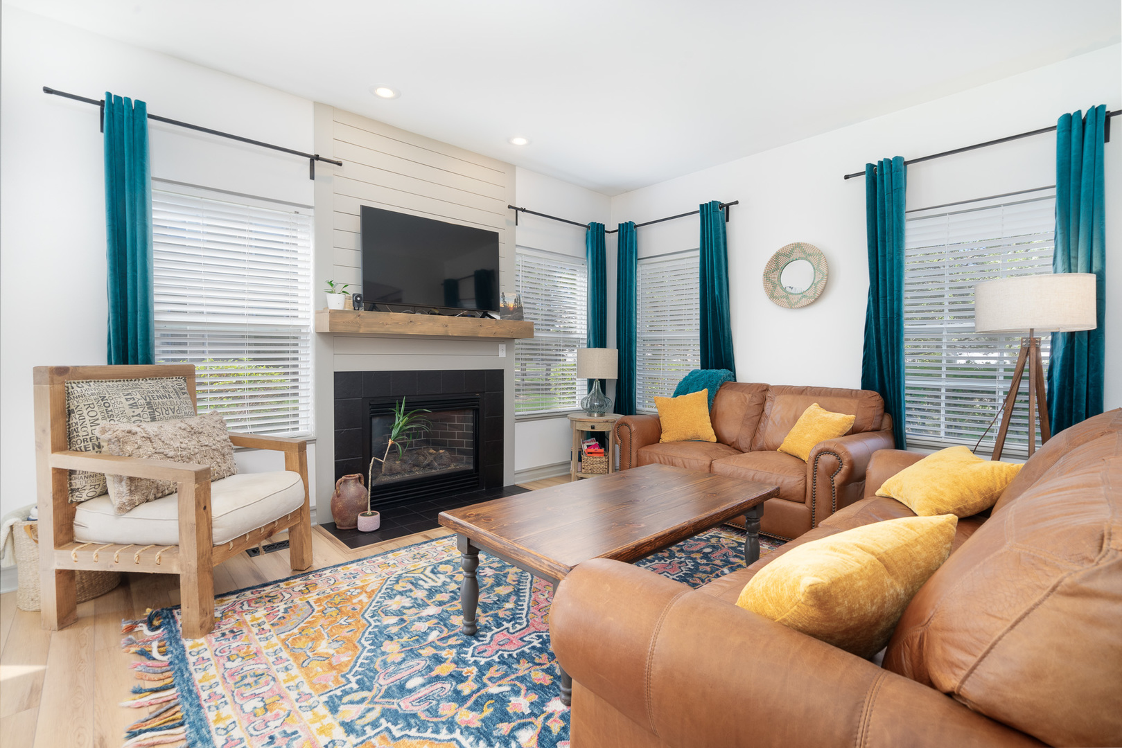 17523 Gilbert Drive Lockport, IL 60441 - Photo 8 of 34 a living room with furniture a flat screen tv and a fireplace