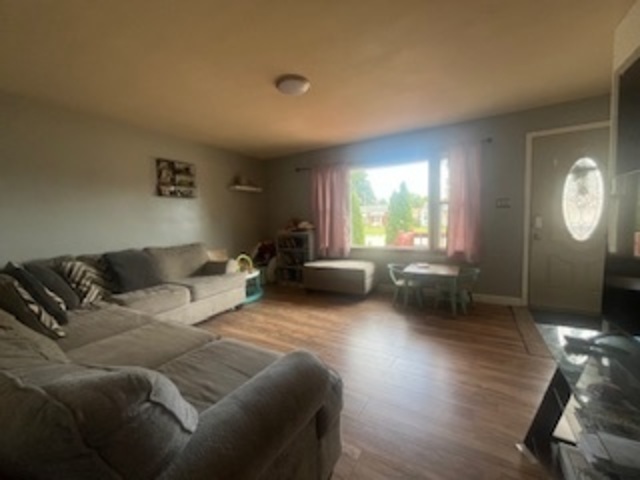1581 South 4th Avenue Kankakee, IL 60901 - Photo 4 of 18 a living room with furniture and a large window
