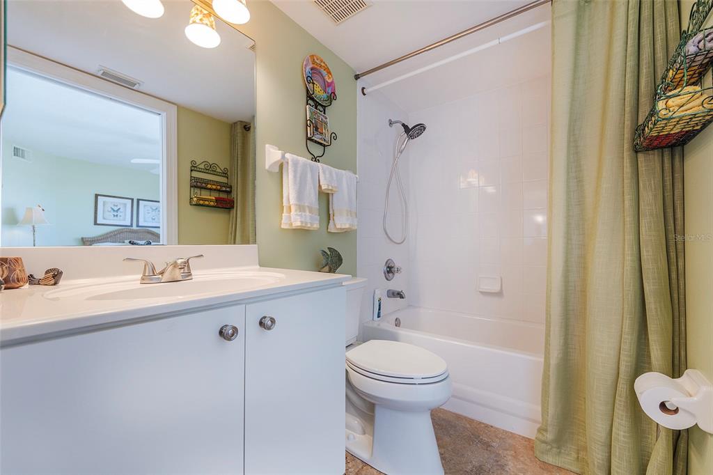 4631 South Atlantic Avenue, Unit 8601 Ponce Inlet, FL 32127 - Photo 23 of 64 a bathroom with a sink a toilet and shower