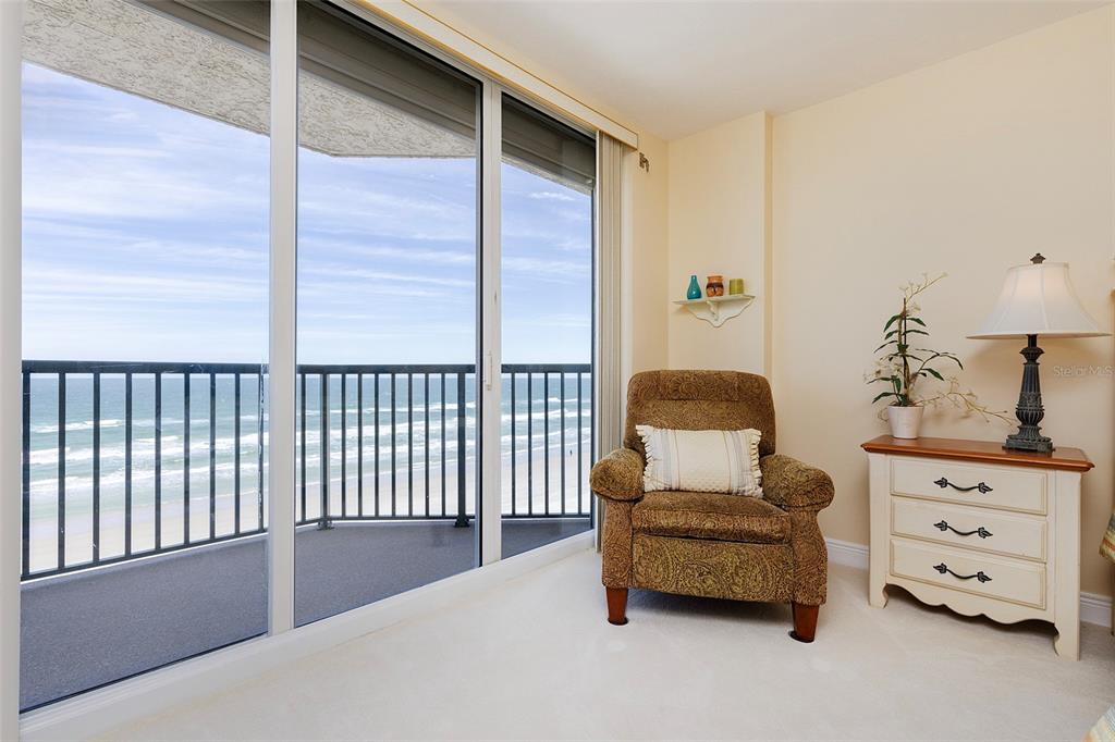 4631 South Atlantic Avenue, Unit 8601 Ponce Inlet, FL 32127 - Photo 38 of 64 a bedroom with a bed and a window