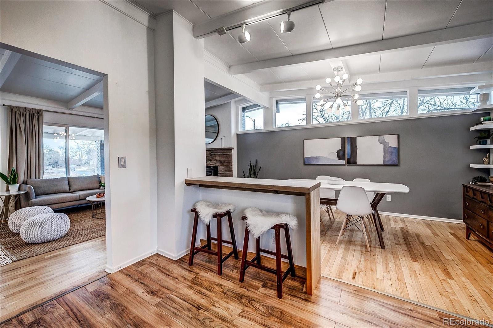 4615 Gordon Drive Boulder, CO 80305 - Photo 11 of 27 a view of a dining room with furniture and wooden floor