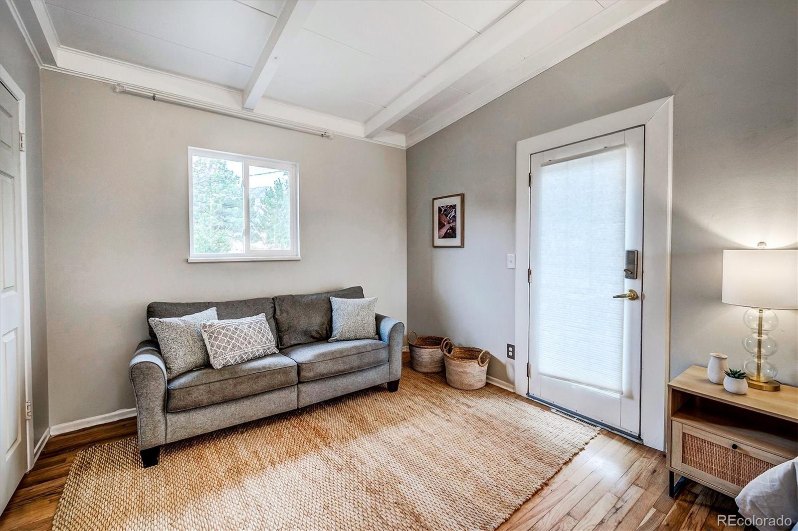 4615 Gordon Drive Boulder, CO 80305 - Photo 15 of 27 a living room with furniture and a couch