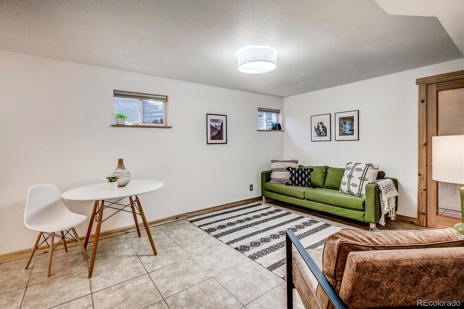 4615 Gordon Drive Boulder, CO 80305 - Photo 19 of 27 a living room with furniture and a rug