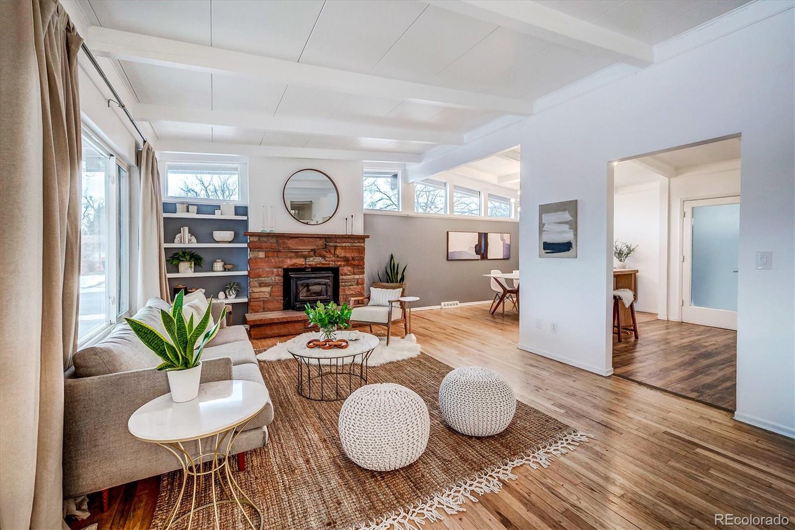 4615 Gordon Drive Boulder, CO 80305 - Photo 4 of 27 a dining room with furniture and a wooden floor