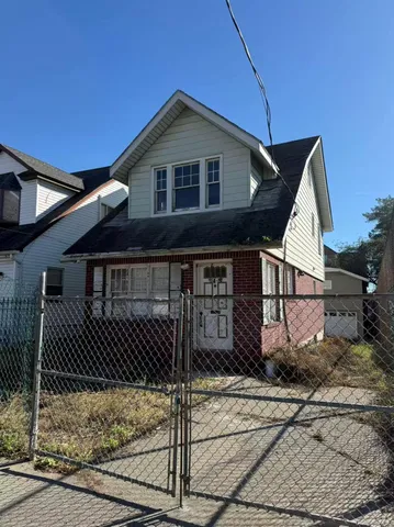 a view of a house with a garage