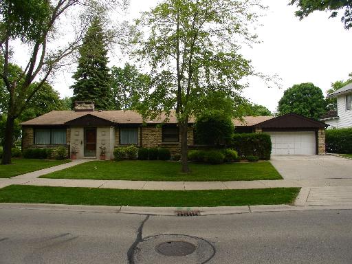 228 Lionel Road Riverside, IL 60546 - Photo 1 of 1 a front view of a house with a yard