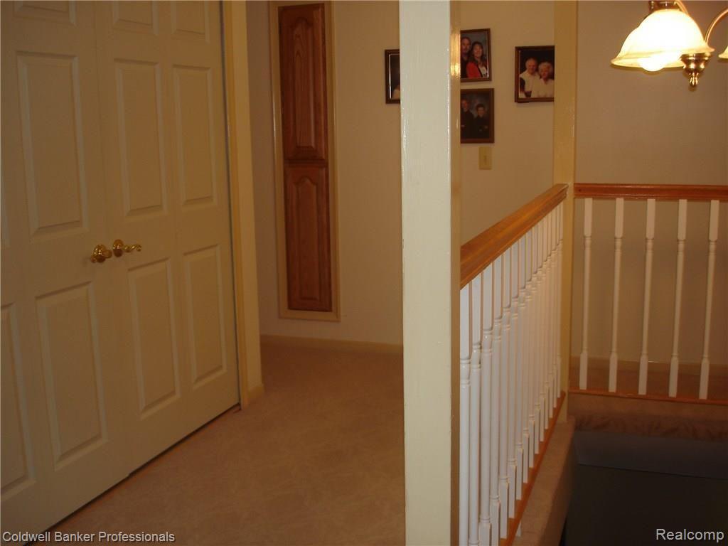 8715 Rattalee Lake Road Clarkston, MI 48348 - Photo 30 of 49 Upstairs Landing with Extra Storage