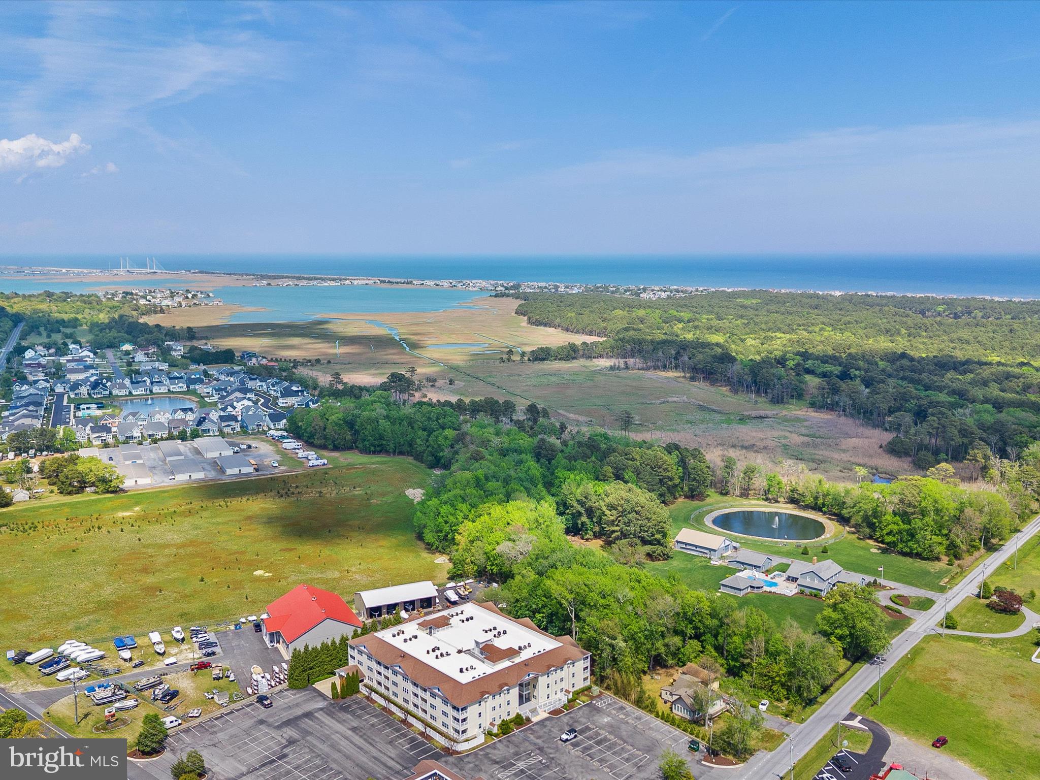 30413 Cedar Neck Road, Unit 304 Ocean View, DE 19970 - Photo 2 of 46 a view of a city with an ocean