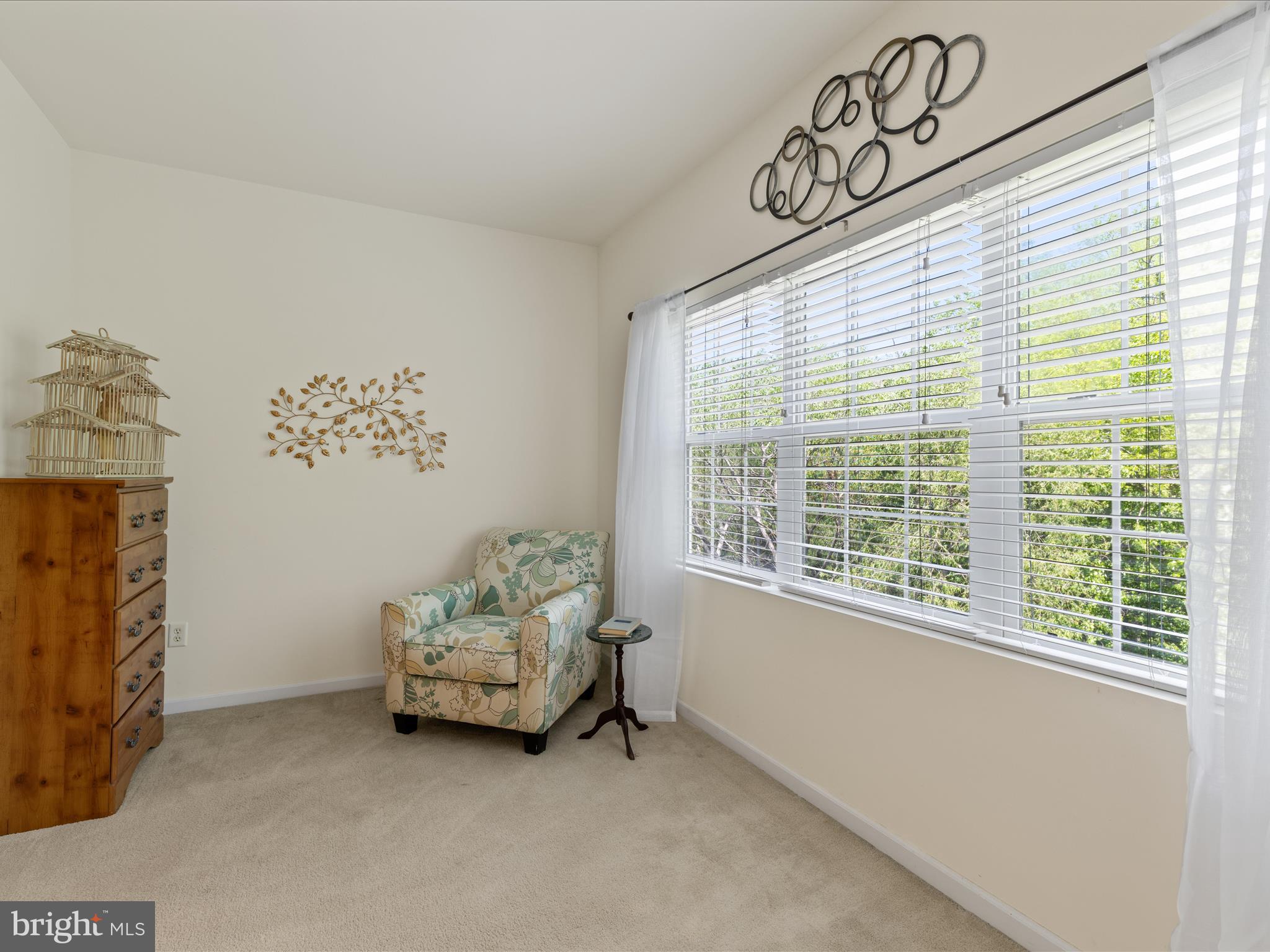 30413 Cedar Neck Road, Unit 304 Ocean View, DE 19970 - Photo 22 of 46 a living room with furniture and a window