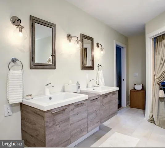 a bedroom with bed and window