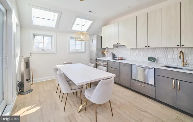 an aerial view of a house with a lake view