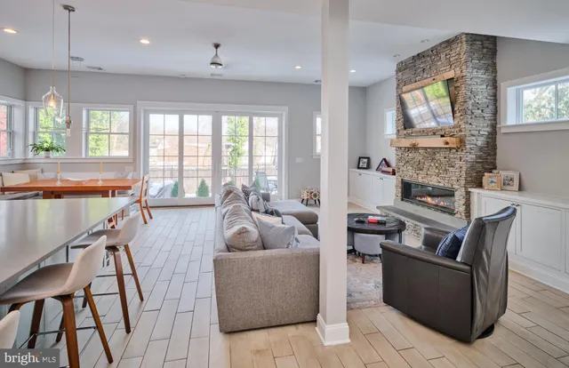 a room with wooden furniture and a table