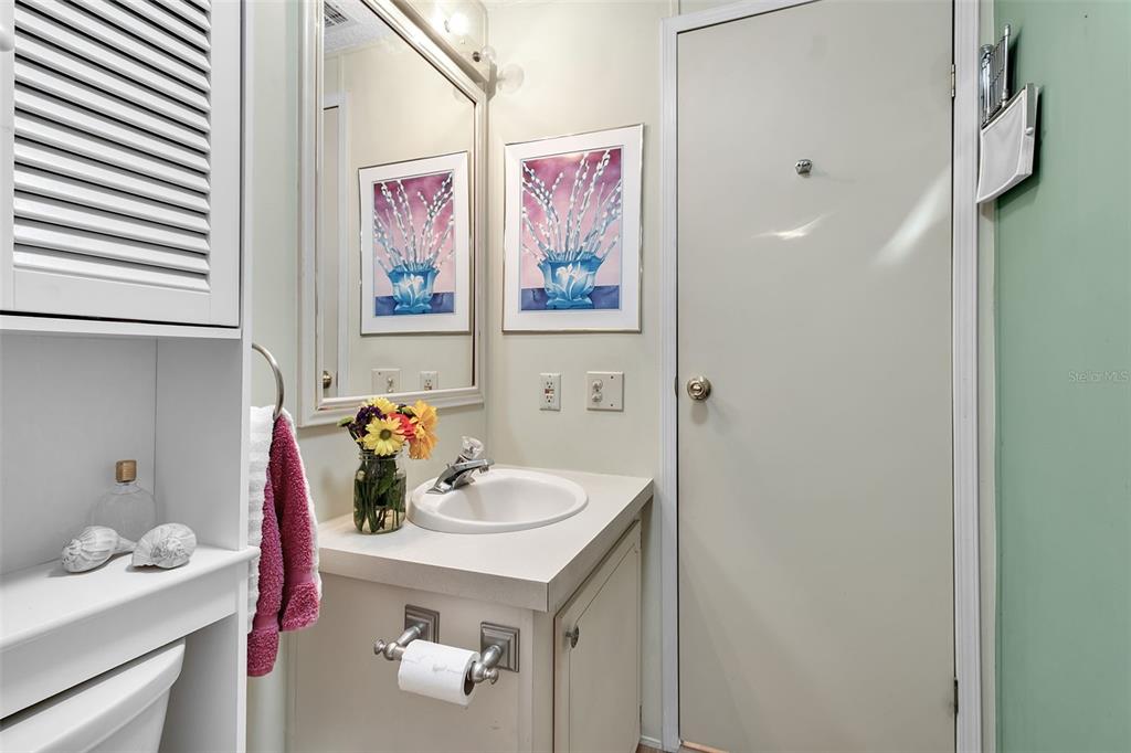 10315 Cortez Road West, Unit 26J Bradenton, FL 34210 - Photo 28 of 69 a bathroom with a sink and a mirror