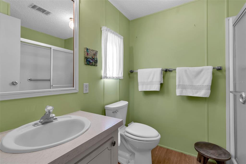 10315 Cortez Road West, Unit 26J Bradenton, FL 34210 - Photo 31 of 69 a bathroom with a sink and a mirror