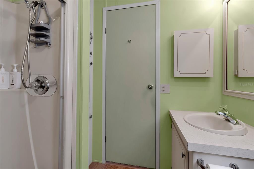 10315 Cortez Road West, Unit 26J Bradenton, FL 34210 - Photo 32 of 69 a bathroom with a sink and mirror