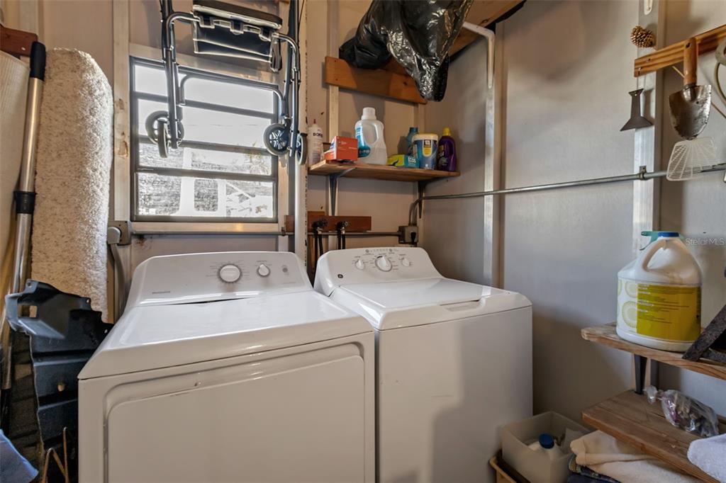 10315 Cortez Road West, Unit 26J Bradenton, FL 34210 - Photo 35 of 69 a utility room with dryer and washer