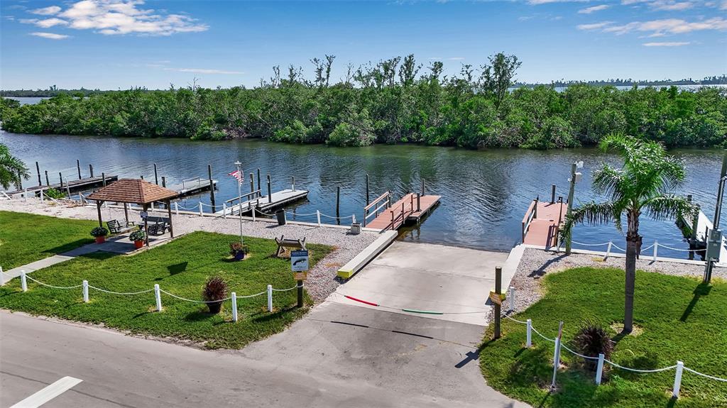 10315 Cortez Road West, Unit 26J Bradenton, FL 34210 - Photo 44 of 69 an outdoor sitting area with lake view