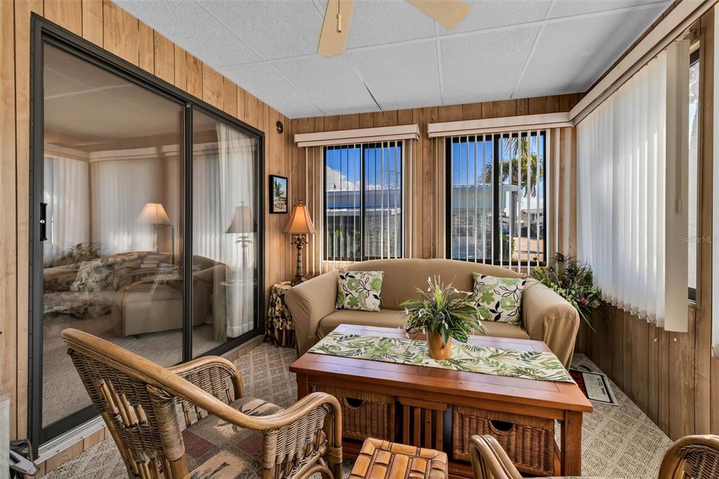 10315 Cortez Road West, Unit 26J Bradenton, FL 34210 - Photo 5 of 69 a living room with furniture and wooden floor