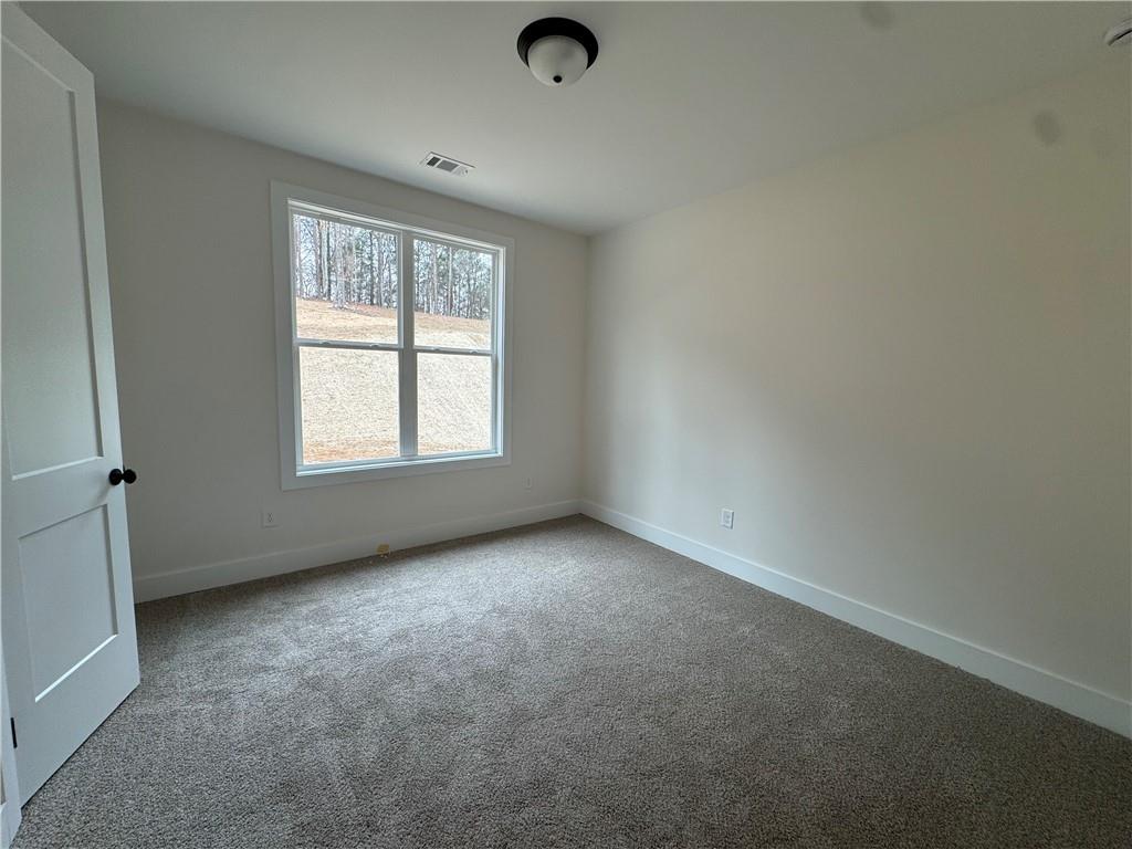 1699 Darby Road Waleska, GA 30183 - Photo 15 of 17 an empty room with window