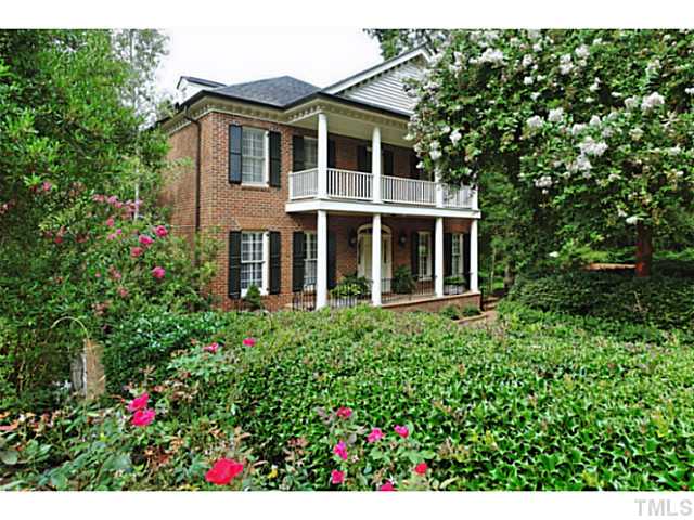 817 Lassiter Place Raleigh, NC 27609 - Photo 1 of 24 a view of a house with a flower garden