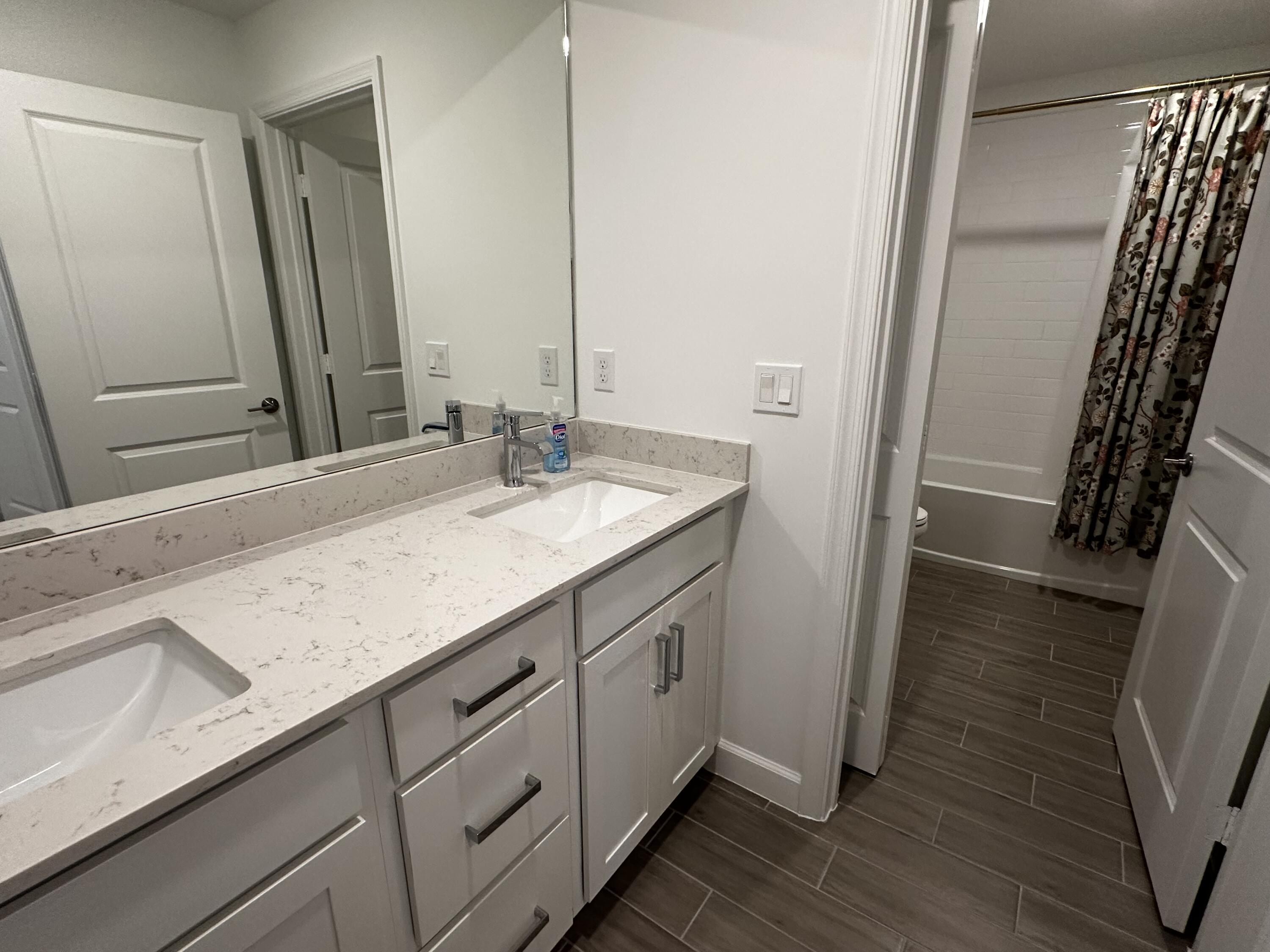 3507 Bauer Road Royal Palm Beach, FL 33411 - Photo 24 of 26 a bathroom with a sink and a mirror