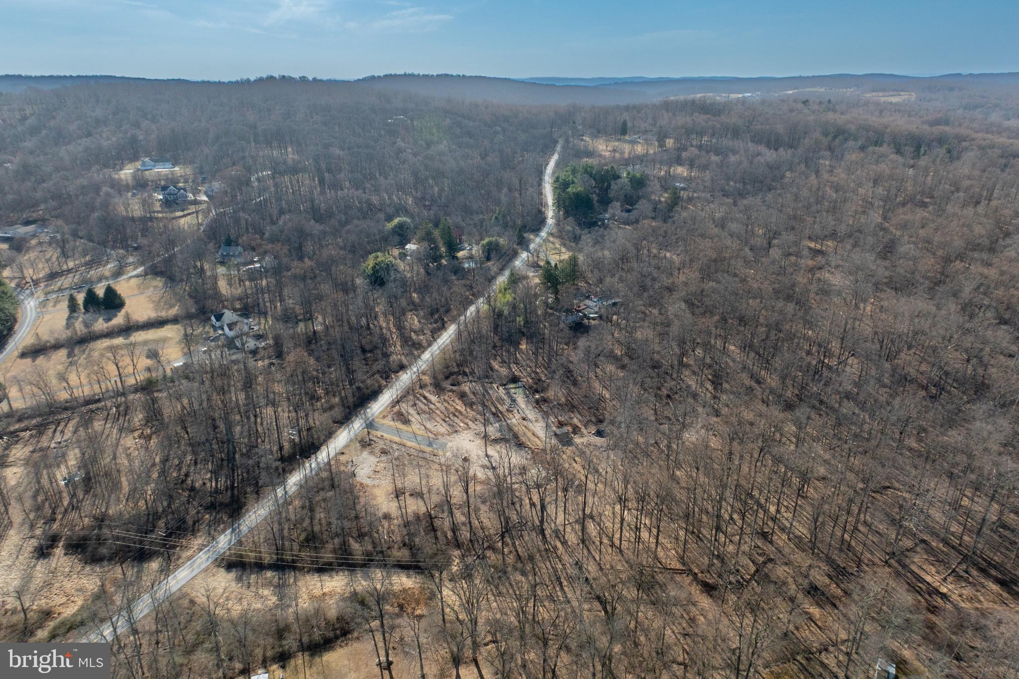 334 Forgedale Road Barto, PA 19504 - Photo 22 of 22 a view of a houses with a forest