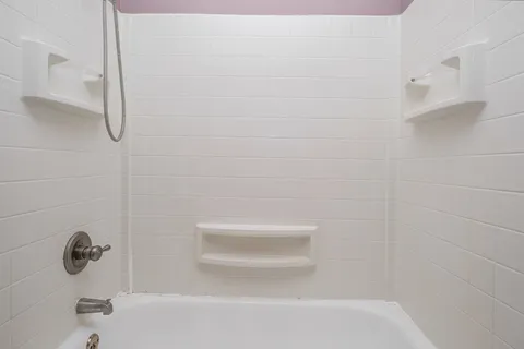 a bathroom with a bathtub
