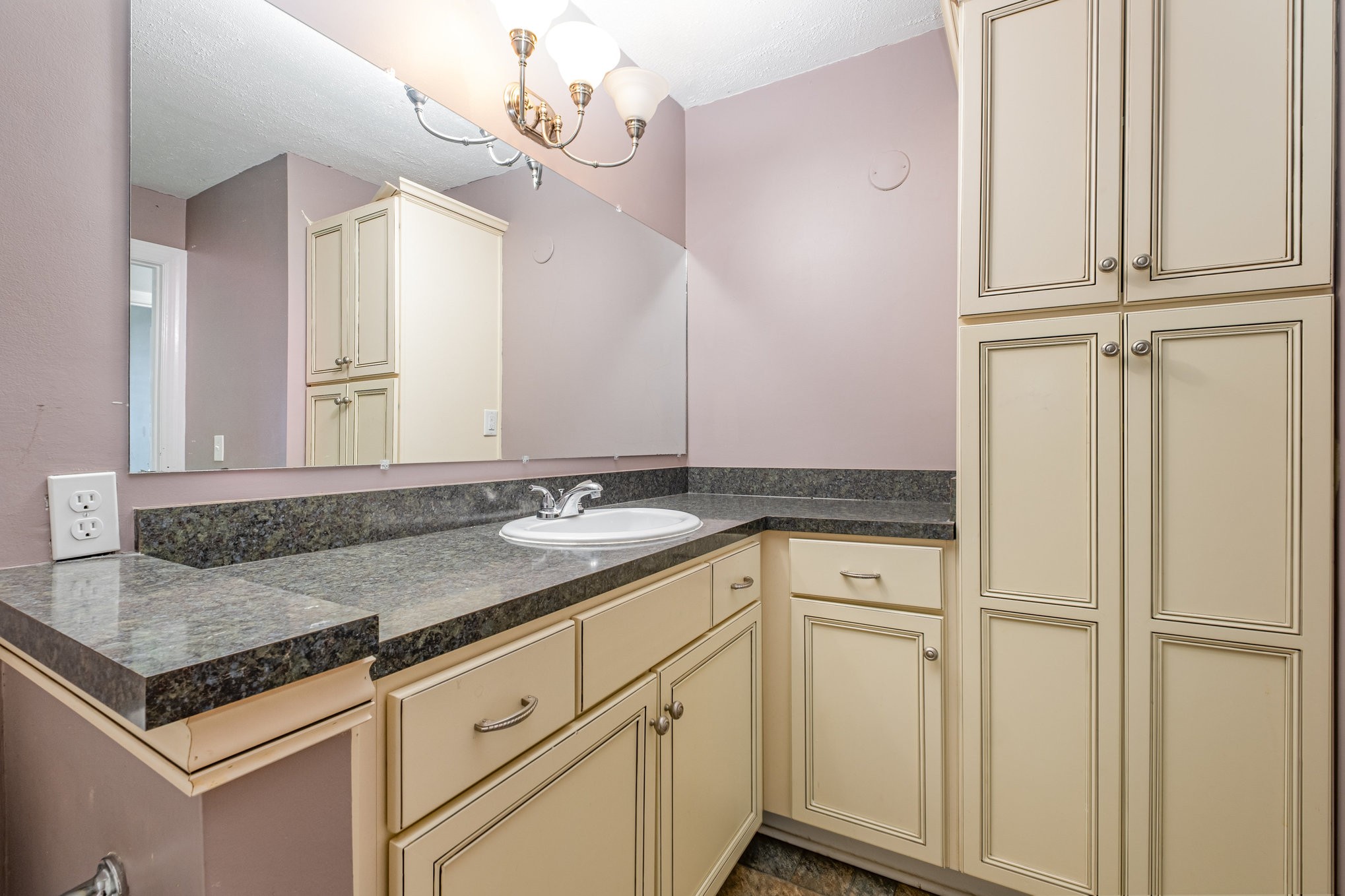 1280 Middle Tennessee Boulevard, Unit F8 Murfreesboro, TN 37130 - Photo 6 of 18 a bathroom with a granite countertop sink and a mirror
