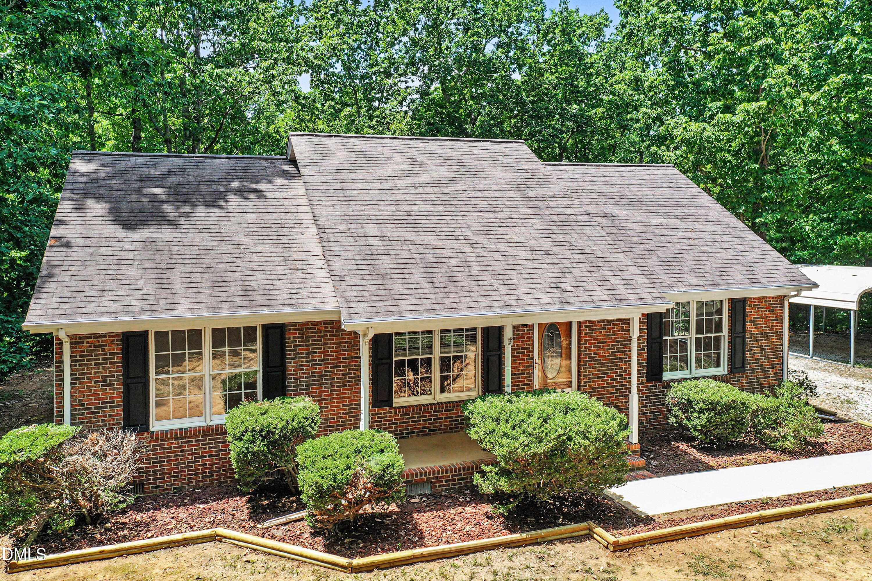 front view of house with a yard