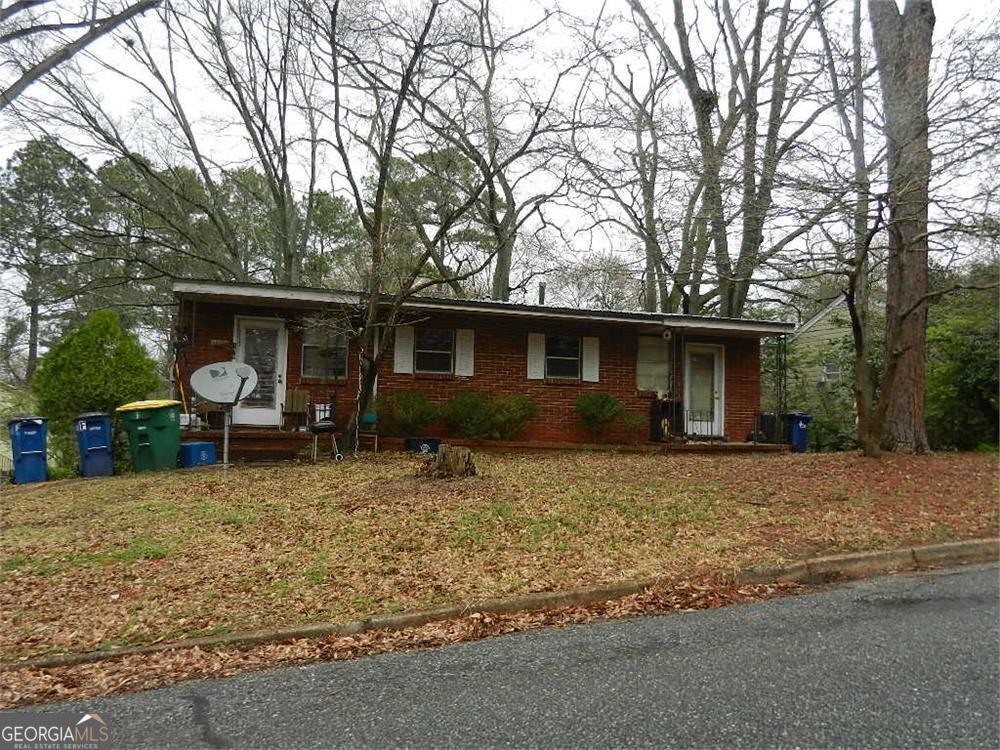 174 Hart Avenue Athens, GA 30606 - Photo 2 of 13 front view of a house with a yard