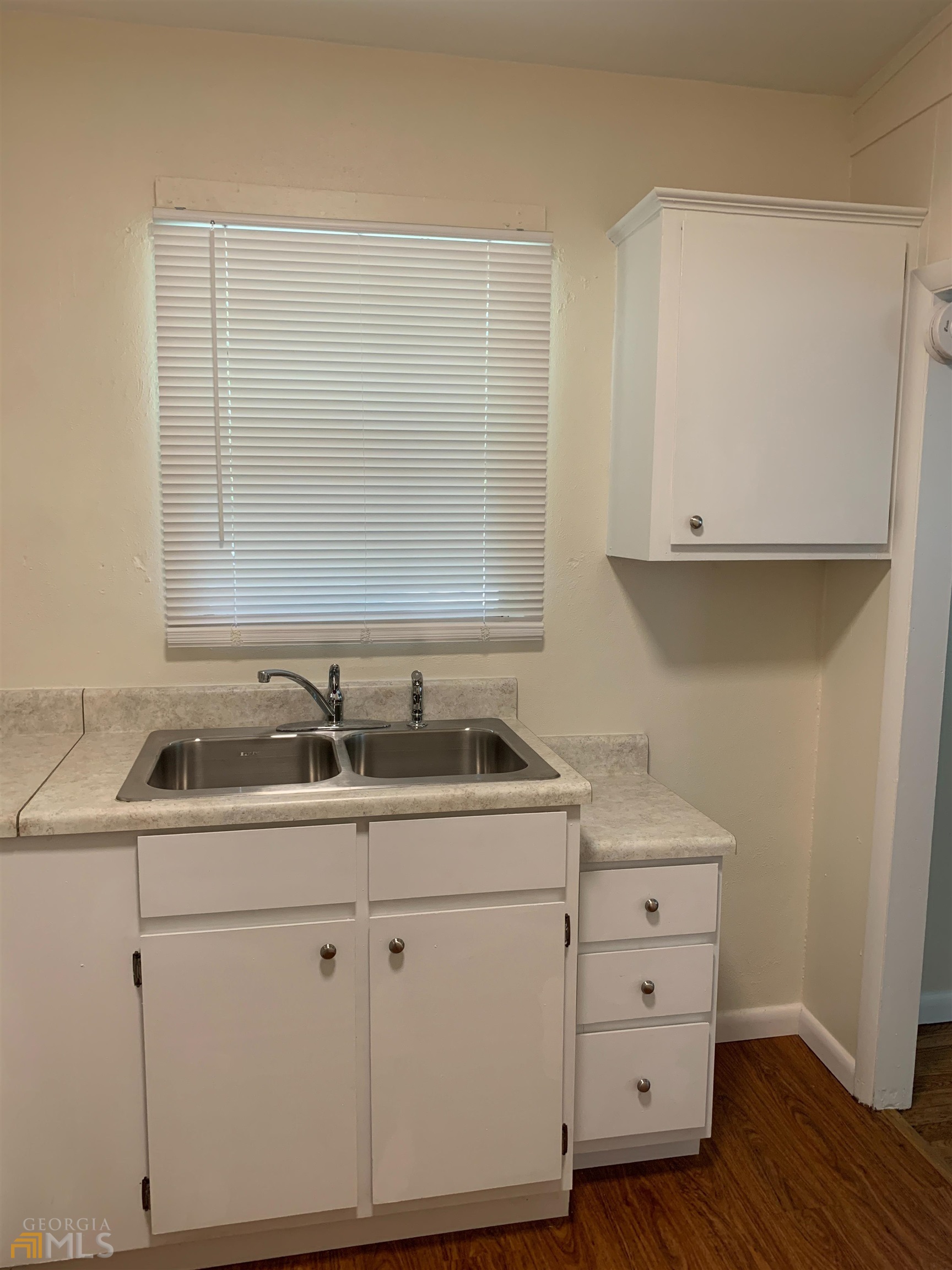 174 Hart Avenue Athens, GA 30606 - Photo 4 of 13 a bathroom with a sink and a mirror