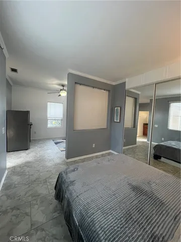 a view of livingroom with furniture and window