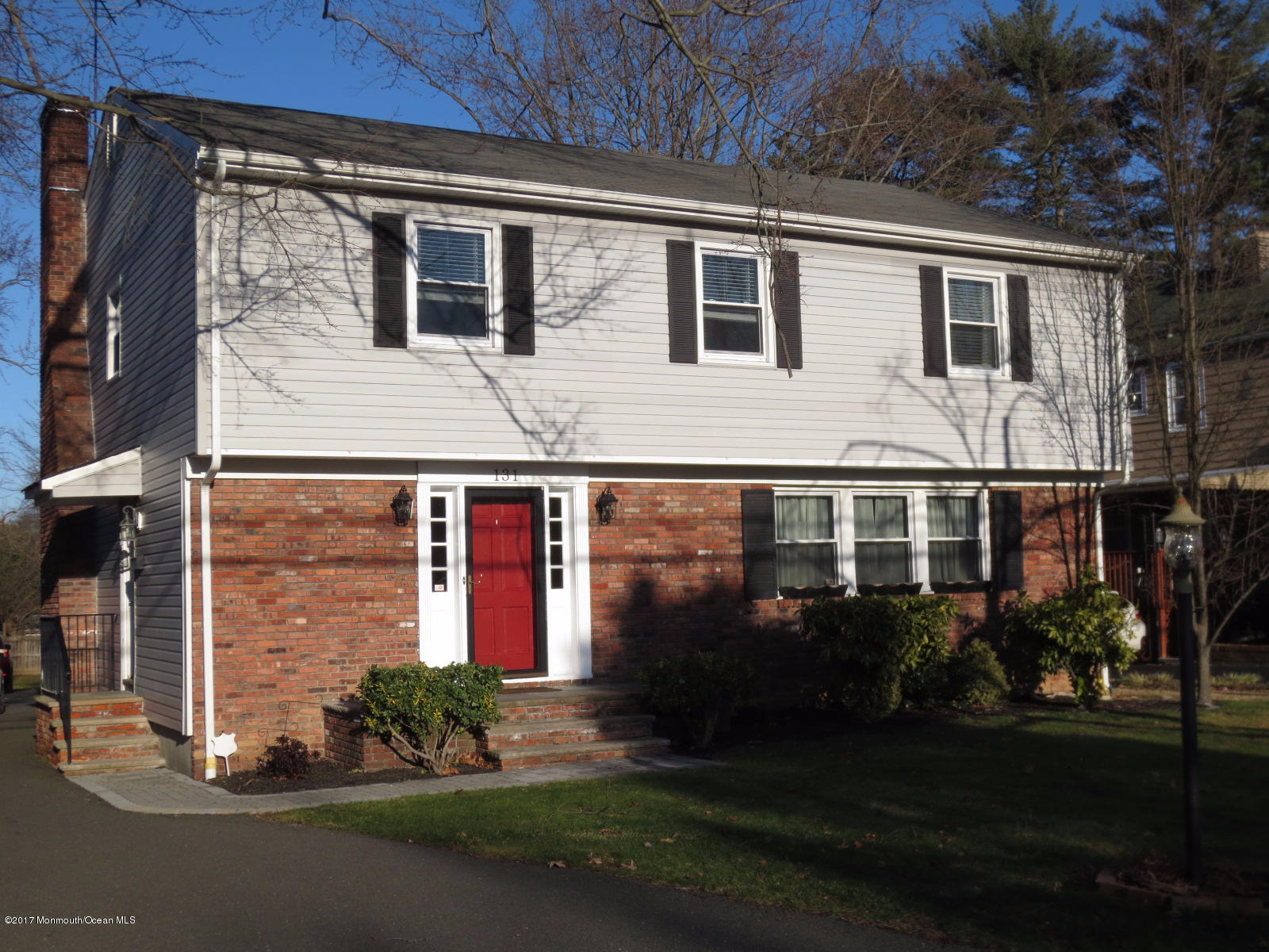 131 Ravine Drive Matawan, NJ 07747 - Photo 1 of 23 a front view of house and yard
