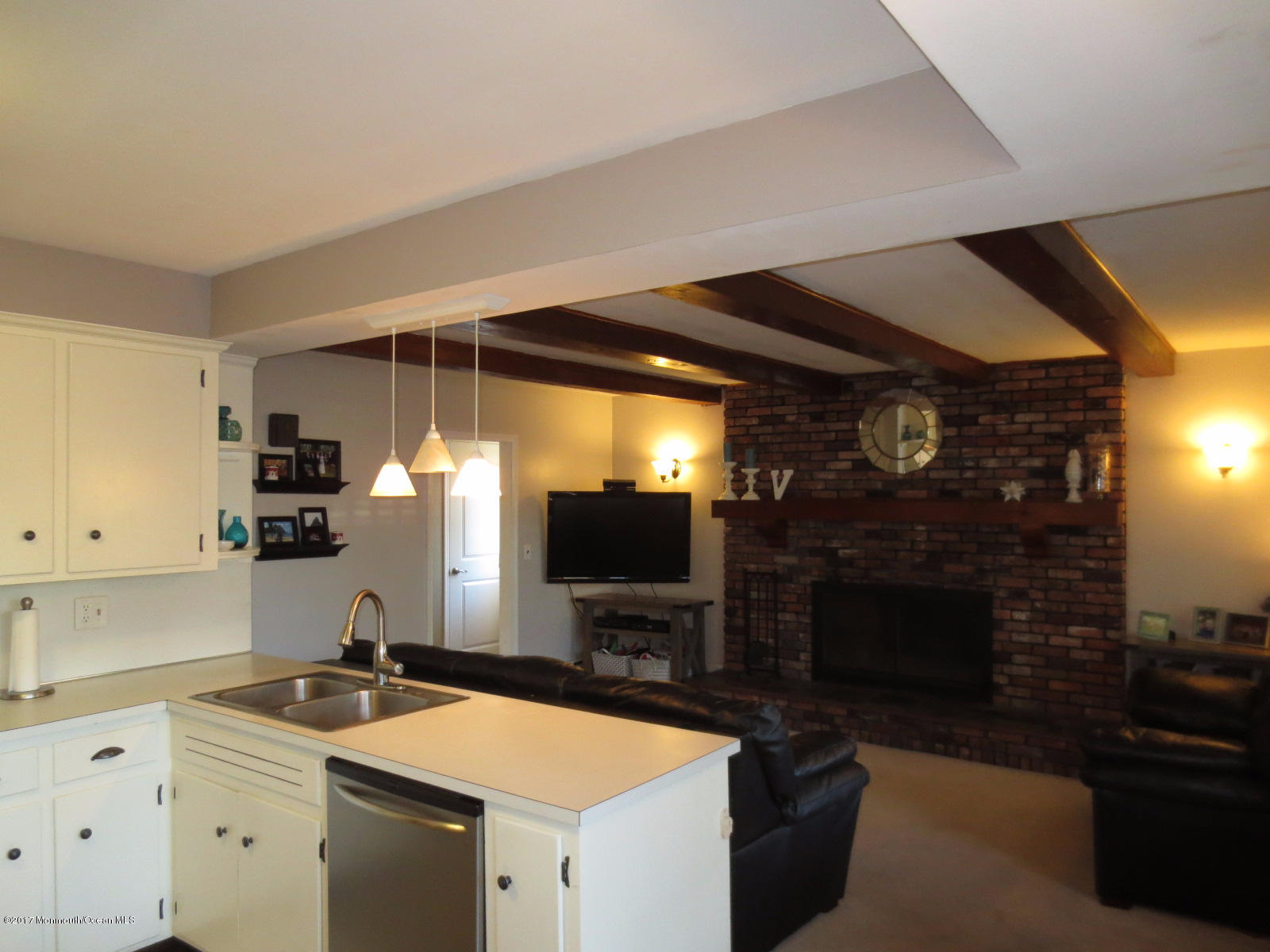 131 Ravine Drive Matawan, NJ 07747 - Photo 9 of 23 a kitchen with a sink and cabinets
