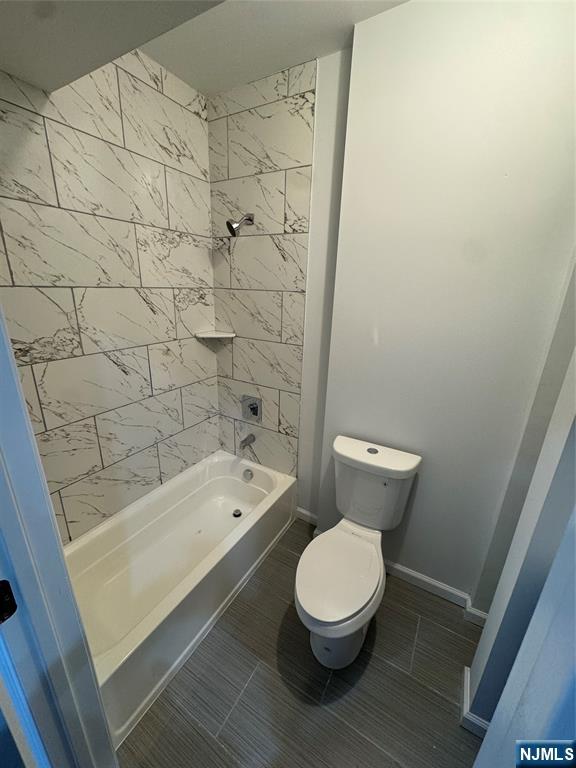 196 Malvern Street, Unit 2 Newark, NJ 07105 - Photo 9 of 16 a bathroom with a toilet and a sink