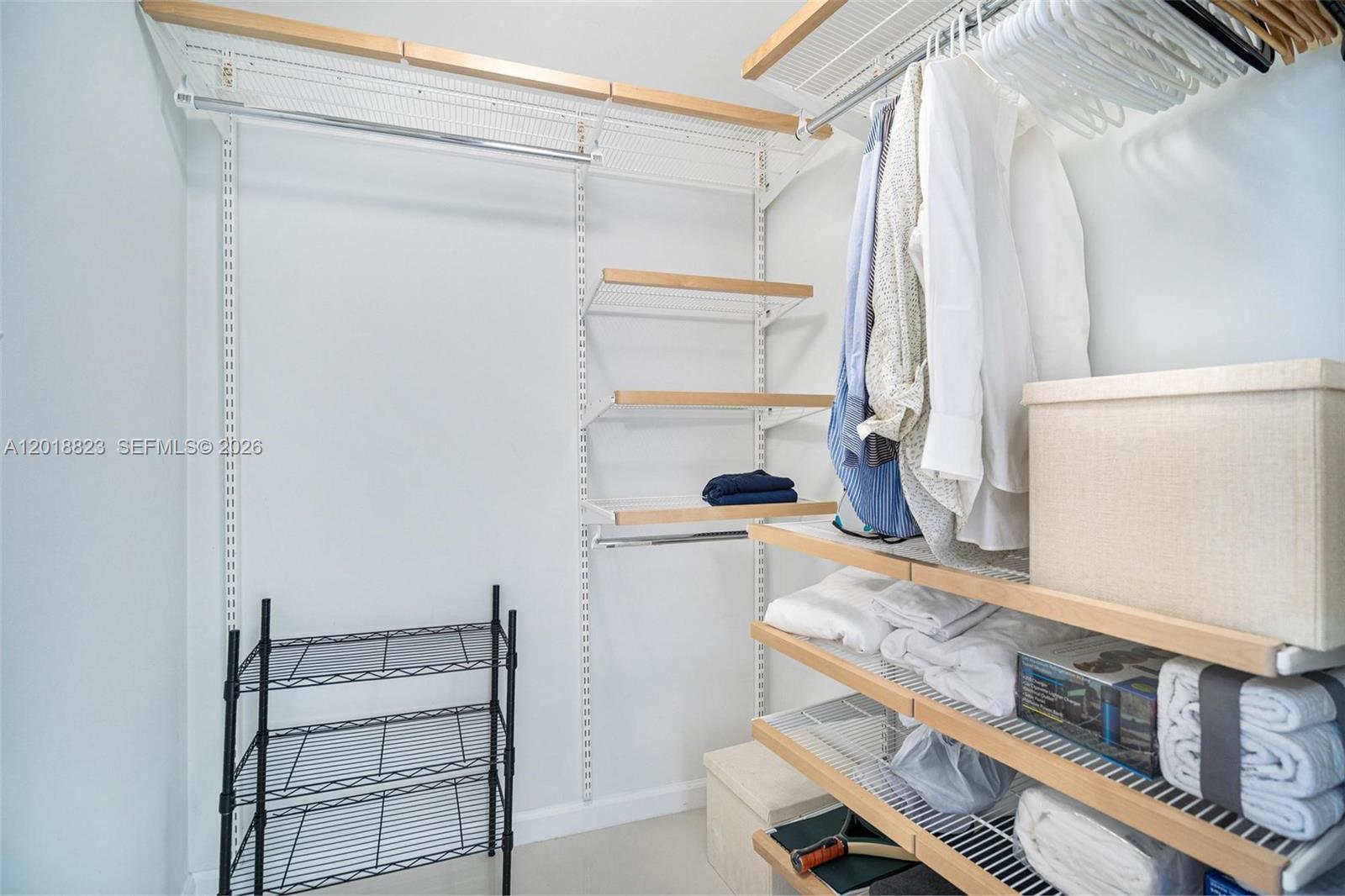 495 Brickell Avenue, Unit 4911 Miami, FL 33131 - Photo 23 of 35 a view of small space with racks on the wall