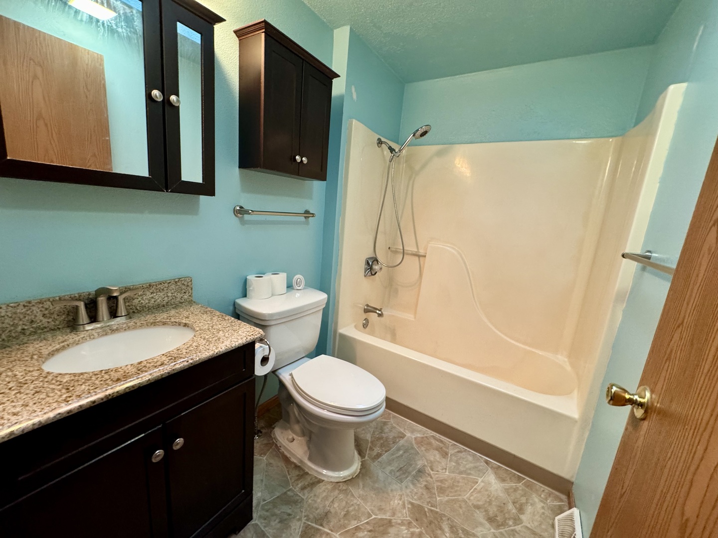 602 East Cherry Avenue Cherry, IL 61317 - Photo 13 of 21 a bathroom with a granite countertop sink toilet and shower