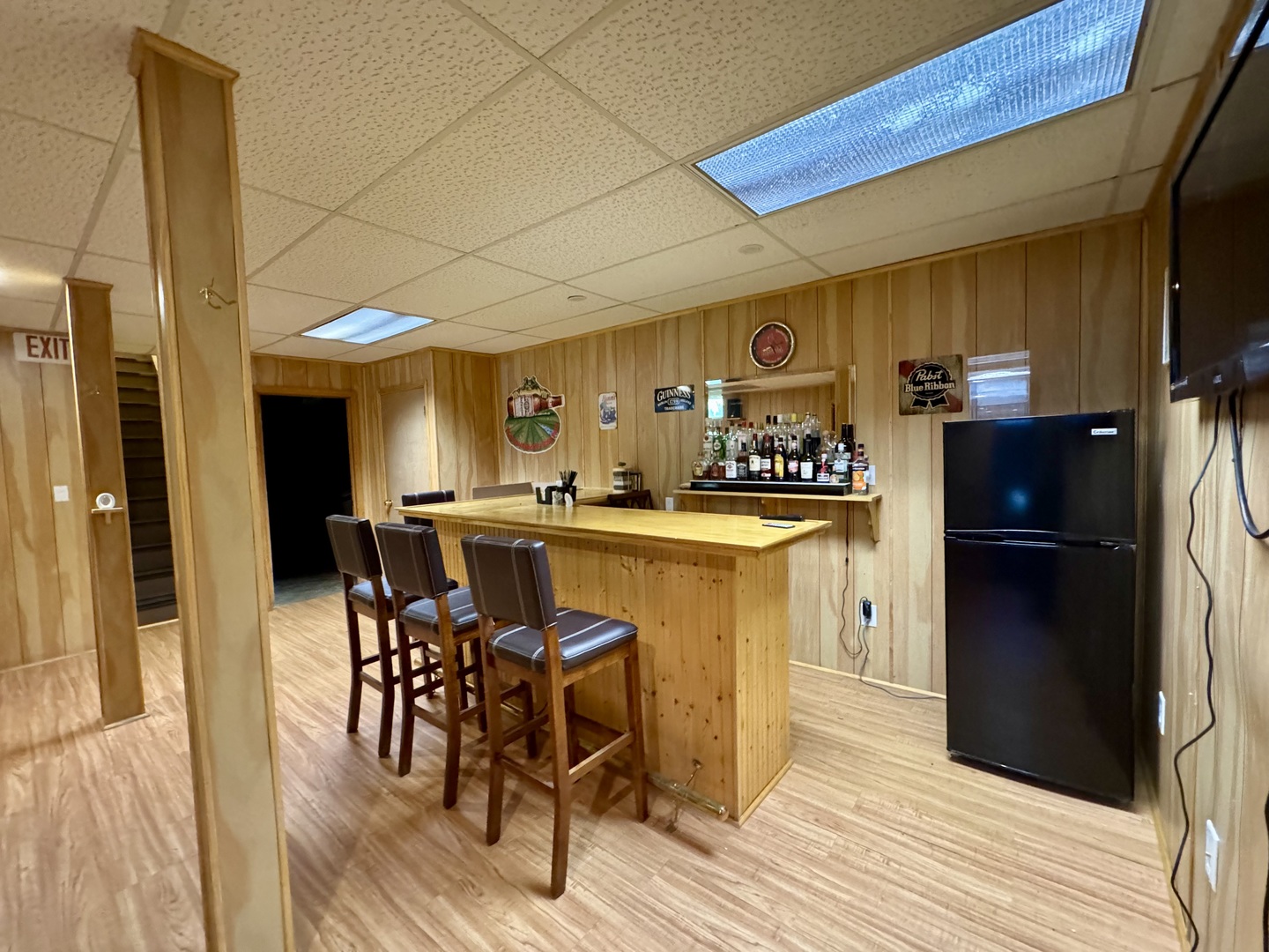 602 East Cherry Avenue Cherry, IL 61317 - Photo 17 of 21 a kitchen with a table chairs refrigerator and cabinets