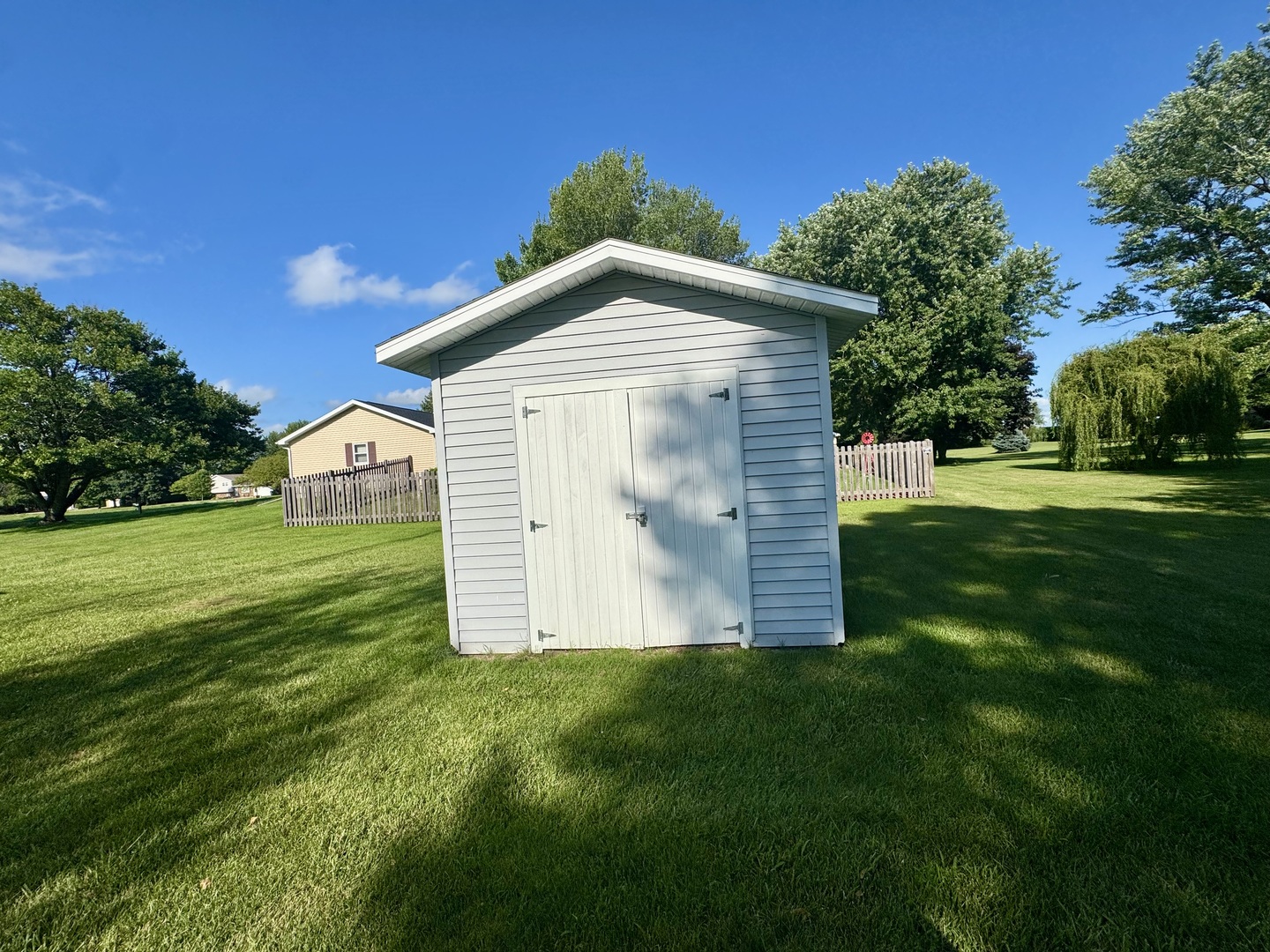 602 East Cherry Avenue Cherry, IL 61317 - Photo 5 of 21 a view of a house with a yard