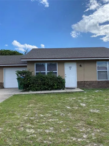 a house view with a garden space