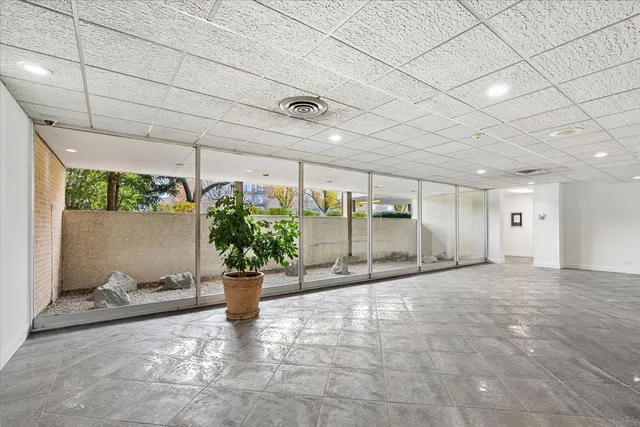 a view of a patio and garden