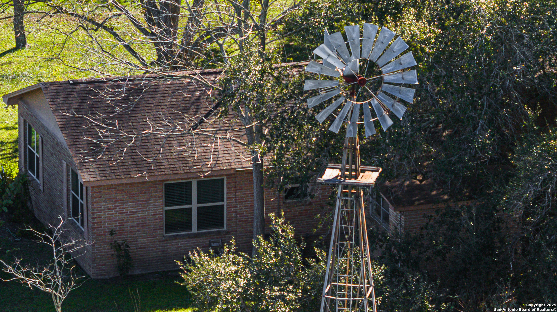 1173 Charco Road Beeville, TX 78102 - Photo 36 of 39 a front view of a house with a tree
