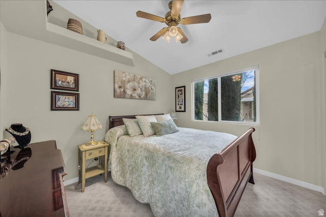 2990 East Riverside Drive, Unit 166 St. George, UT 84790 - Photo 12 of 22 Bedroom featuring carpet floors, a ceiling fan, and lofted ceiling